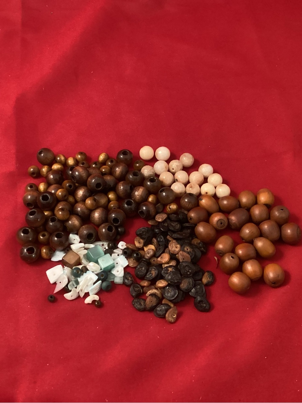 89 grams of Mixed material (include some hazelnut?) beads for crafting